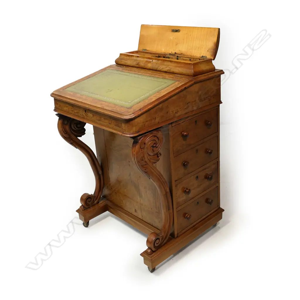 A Victorian figured and burr walnut Davenport desk Image 1++