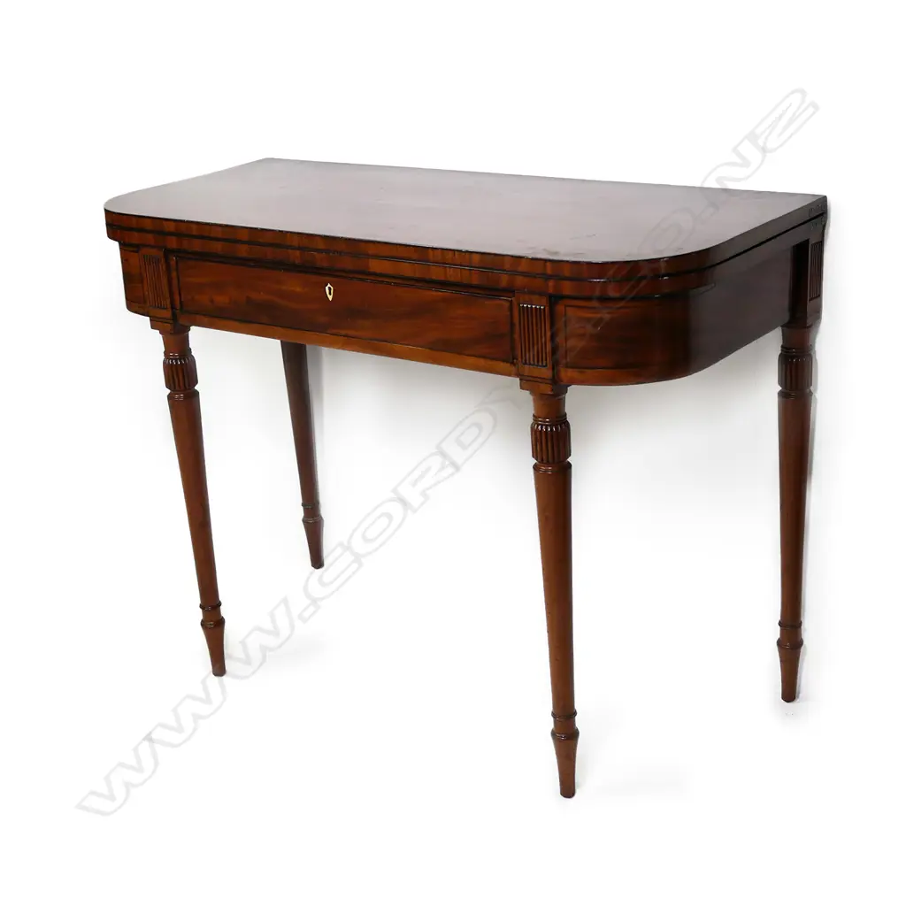 A Regency mahogany fold-over top supper table, Image 1++