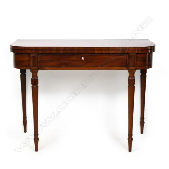 A Regency mahogany fold-over top supper table,