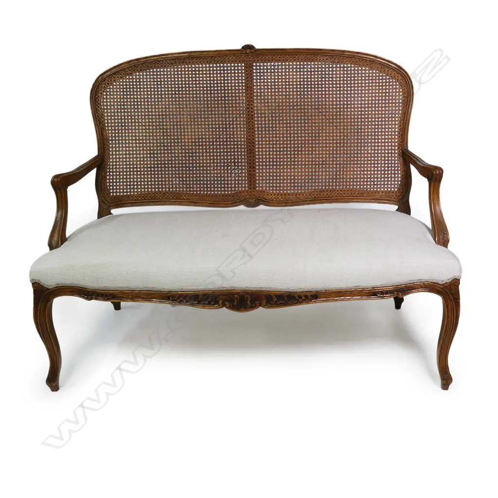 A French Louis XV style walnut framed, cane backed canapé, Image 1++