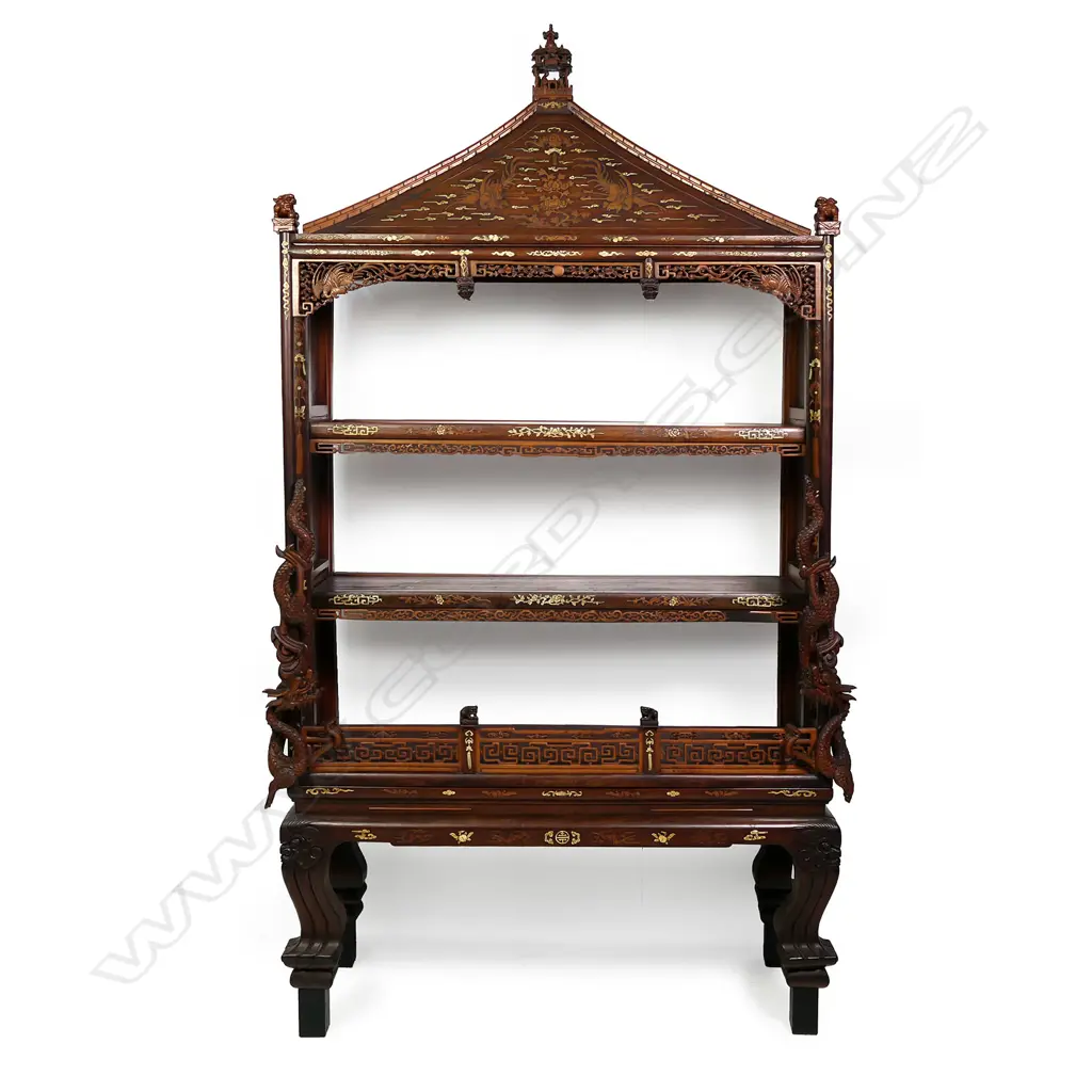 A late 19thC Chinese ornately carved temple top display shelf Image 1++