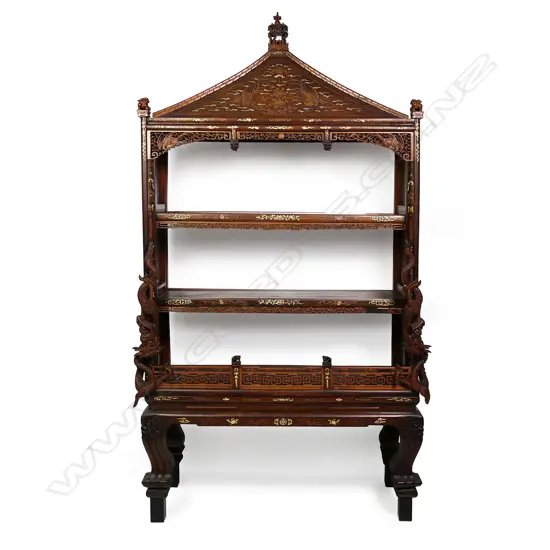 A late 19thC Chinese ornately carved temple top display shelf