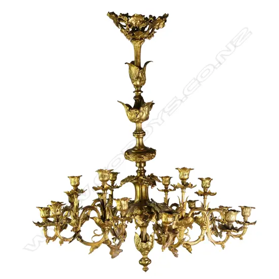 A highly ornate French gilded brass chandelier,