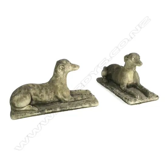 A pair of church stone greyhounds