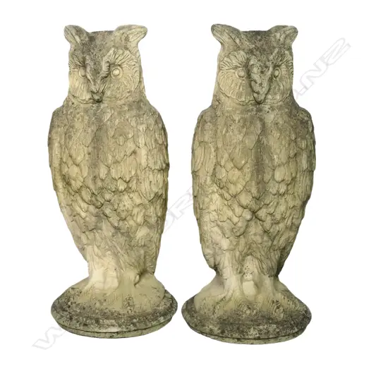 A pair of classical Church Stone owl garden ornaments
