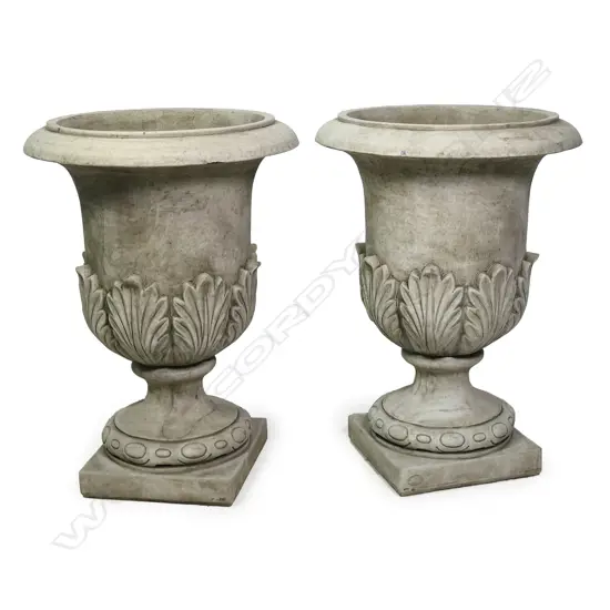 A pair of quality English made cast concrete classical garden urns,