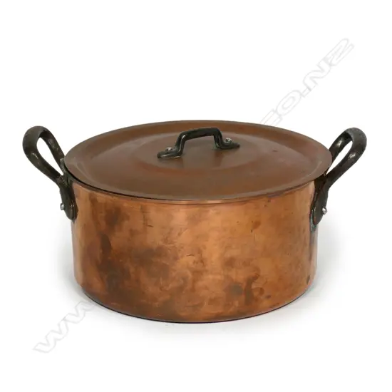 A vintage French copper lidded pot,