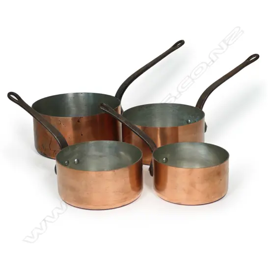 A set of four vintage graduated French heavy copper pots,