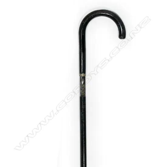 A c.1900 black enamelled sword stick,