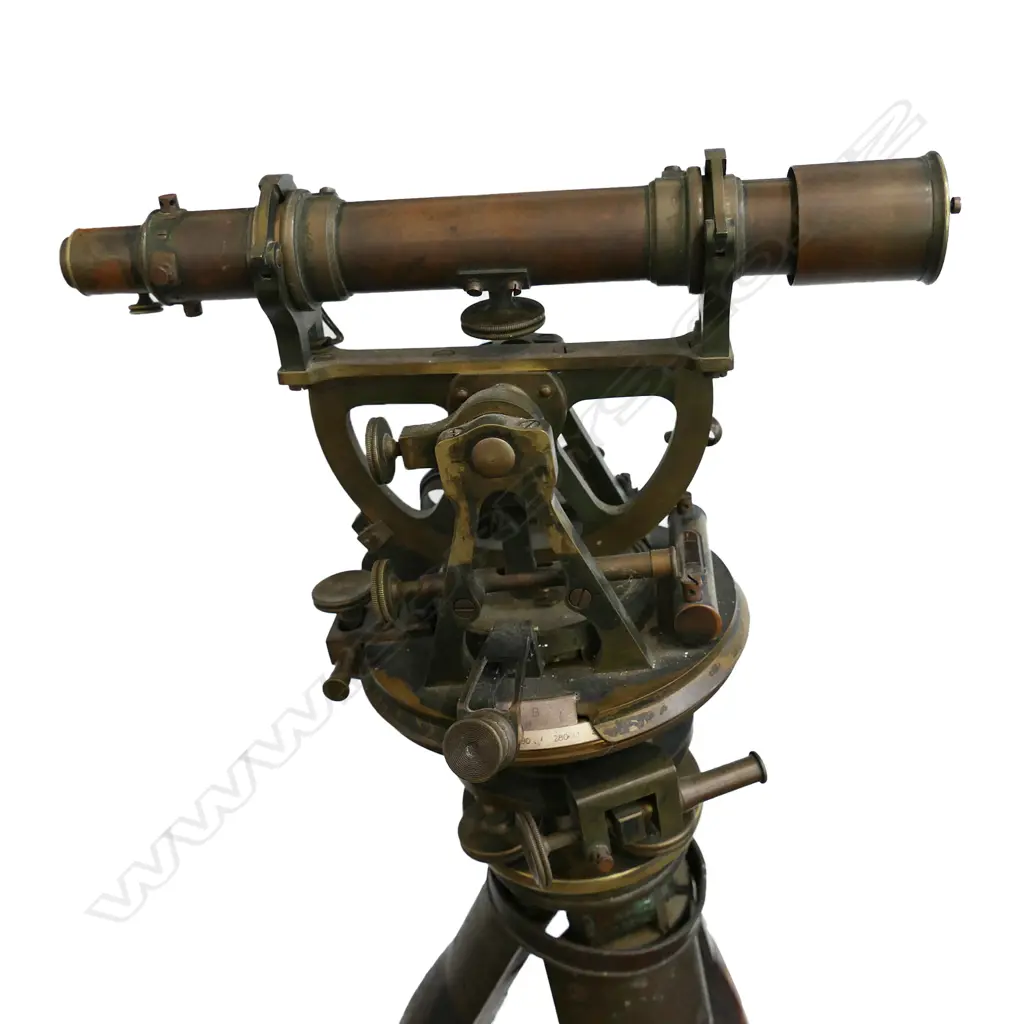 An early 20thC Troughton & Simms Ltd brass surveyor's theodolite, with folding wooden tripod stand, Image 1++