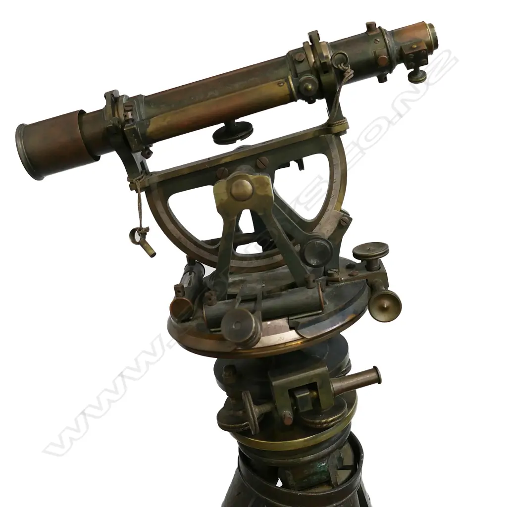 An early 20thC Troughton & Simms Ltd brass surveyor's theodolite, with folding wooden tripod stand, Image 1++
