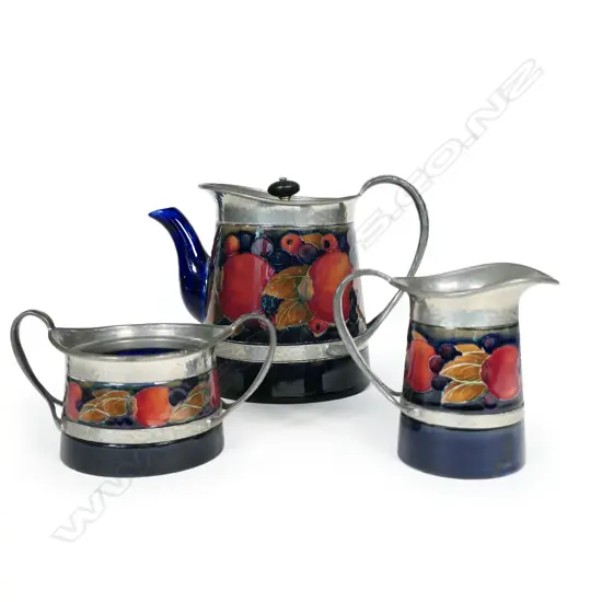 A William Moorcroft ‘Pomegranate’ three-piece tea set,