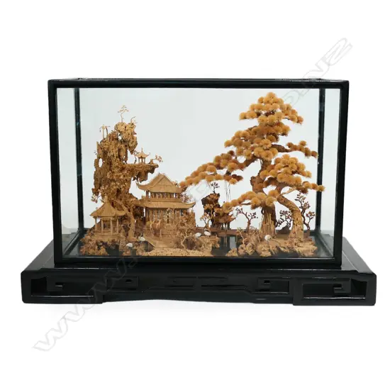 An exceptional very finely carved cork Chinese landscape display