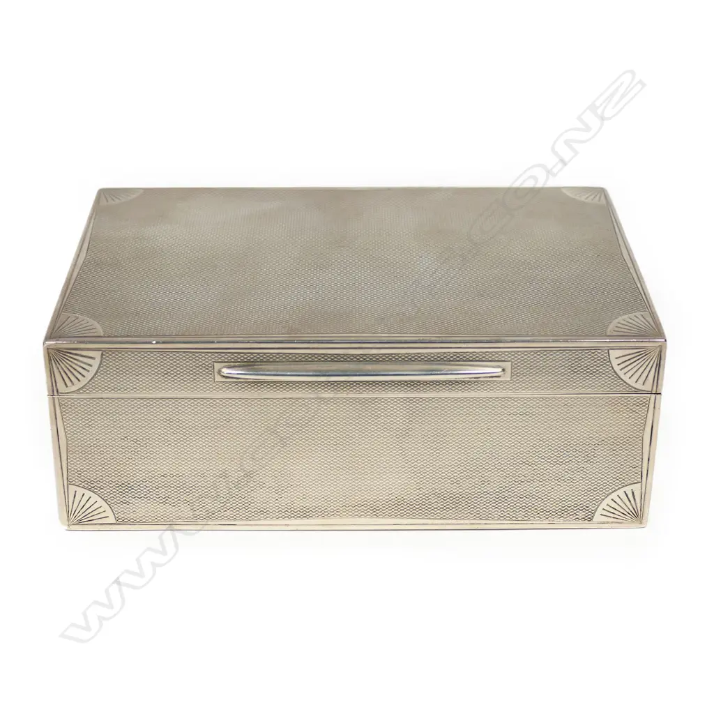 A silver cigarette box, of oblong shape, London 1929 by Ramsden & Roed, Image 1++