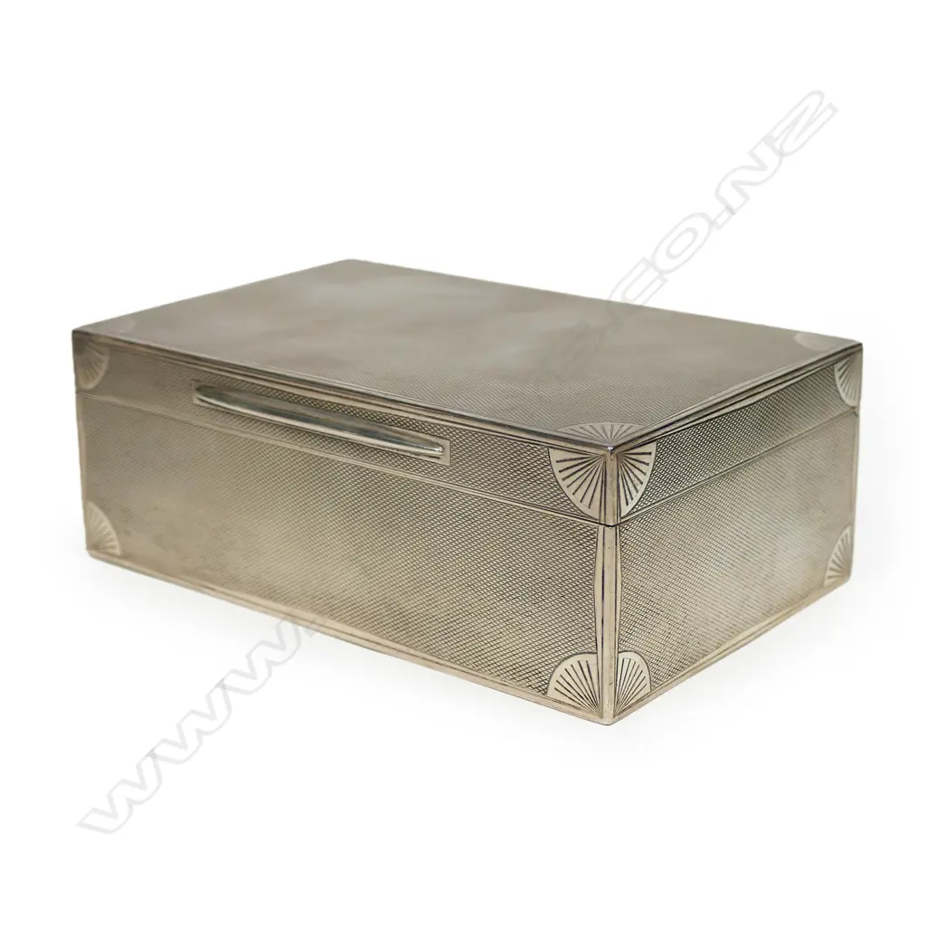 A silver cigarette box, of oblong shape, London 1929 by Ramsden & Roed, Image 1++