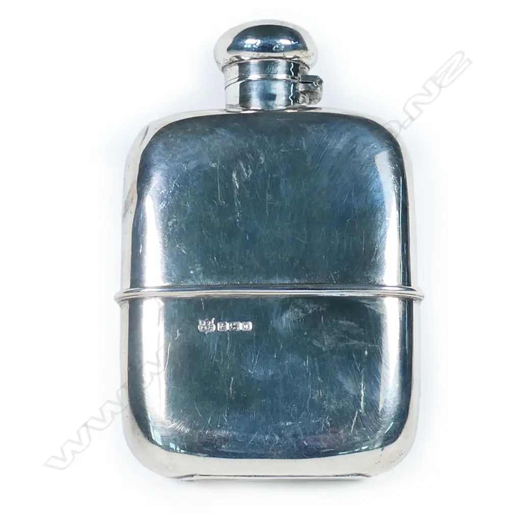 A silver hip flask of rounded rectangular form, Sheffield 1930 by Frederick C. Asman & Co. 132gm., Image 1++