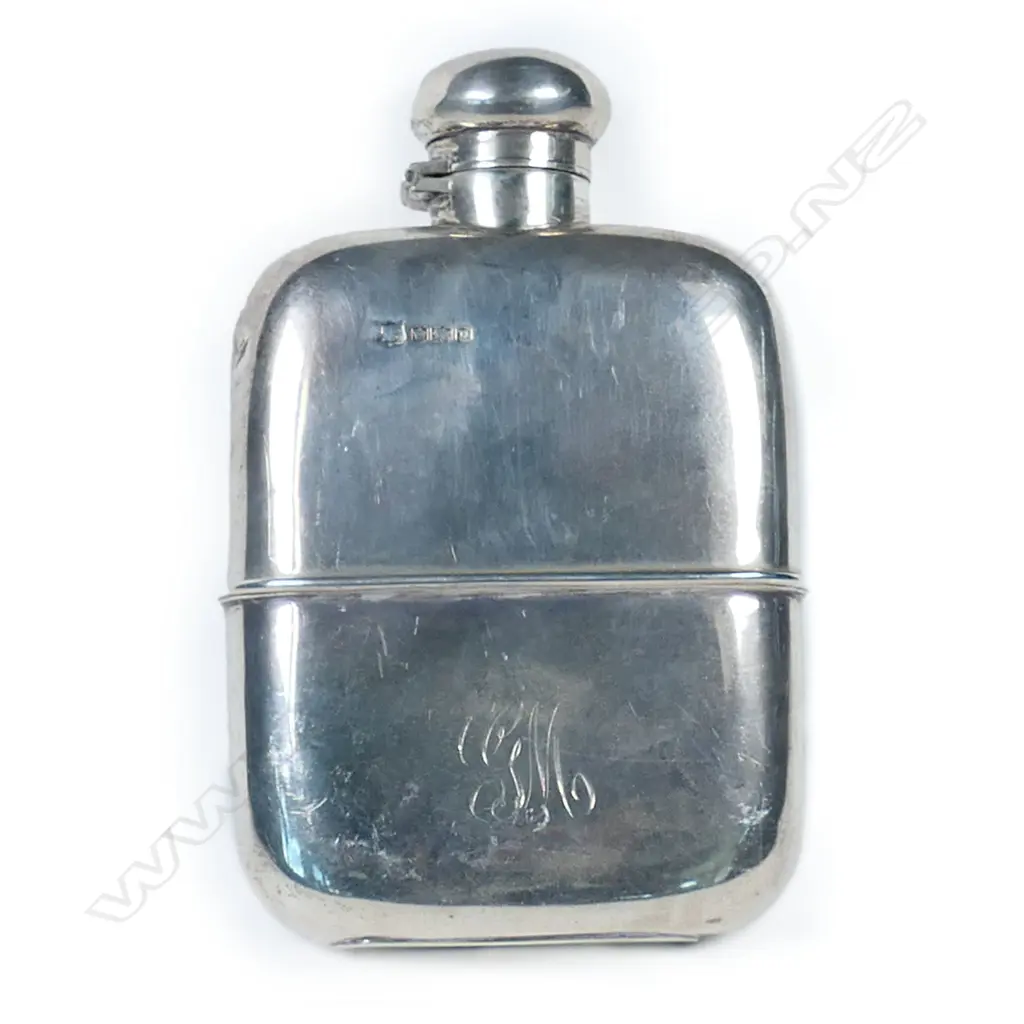 A silver hip flask of rounded rectangular form, Sheffield 1930 by Frederick C. Asman & Co. 132gm., Image 1++