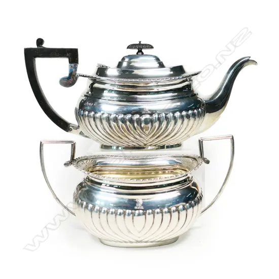 A Victorian silver teapot and sugar bowl by George Nathan & Ridley Hayes. London 1848. 887gms,