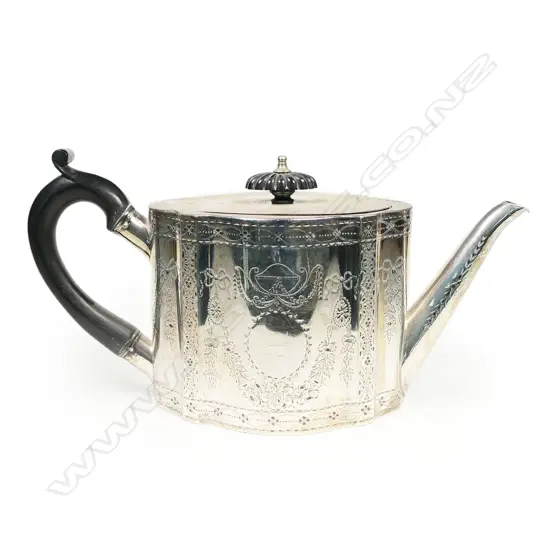 A Victorian silver teapot, London 1871 by H. Lias & Son. 580gm.