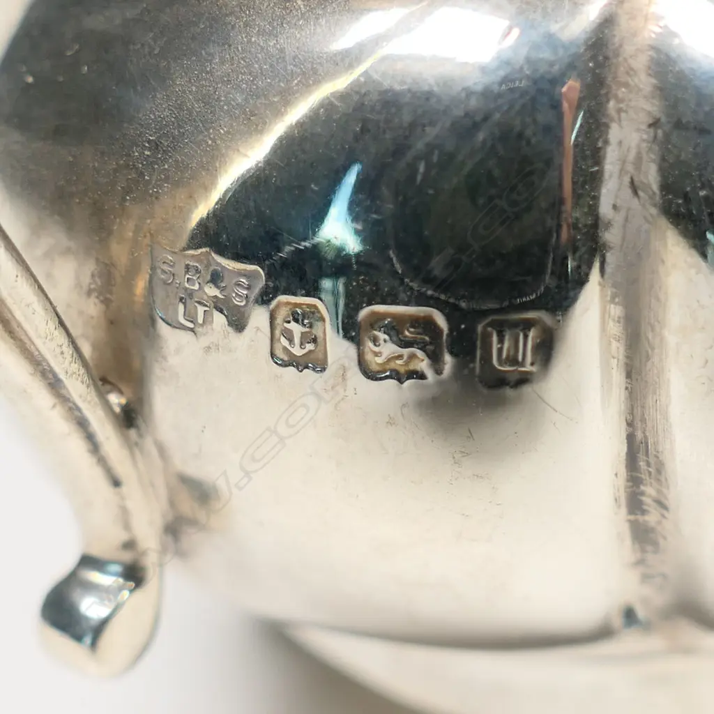 An Edwardian silver cream jug, Birmingham 1919 by S. Blanckensen & Sons Ltd. 102gm. Image 1++