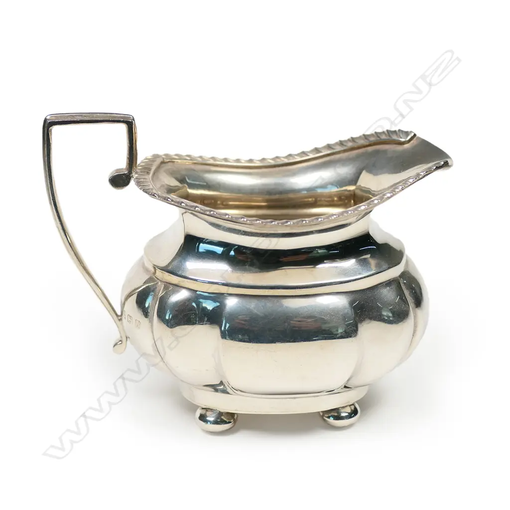 An Edwardian silver cream jug, Birmingham 1919 by S. Blanckensen & Sons Ltd. 102gm. Image 1++