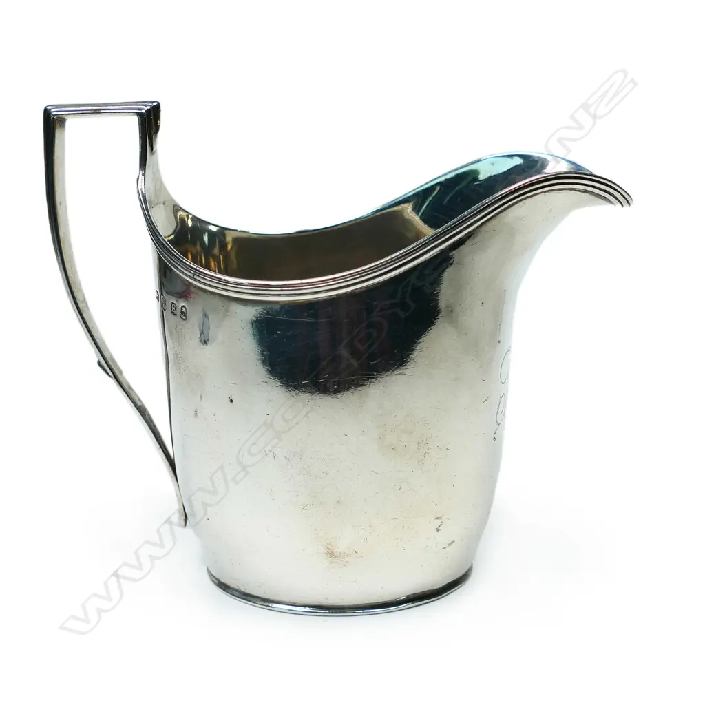 A George III silver flat bottom cream jug, London by John Emes. 164gm. Image 1++