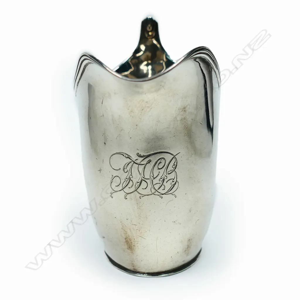 A George III silver flat bottom cream jug, London by John Emes. 164gm. Image 1++