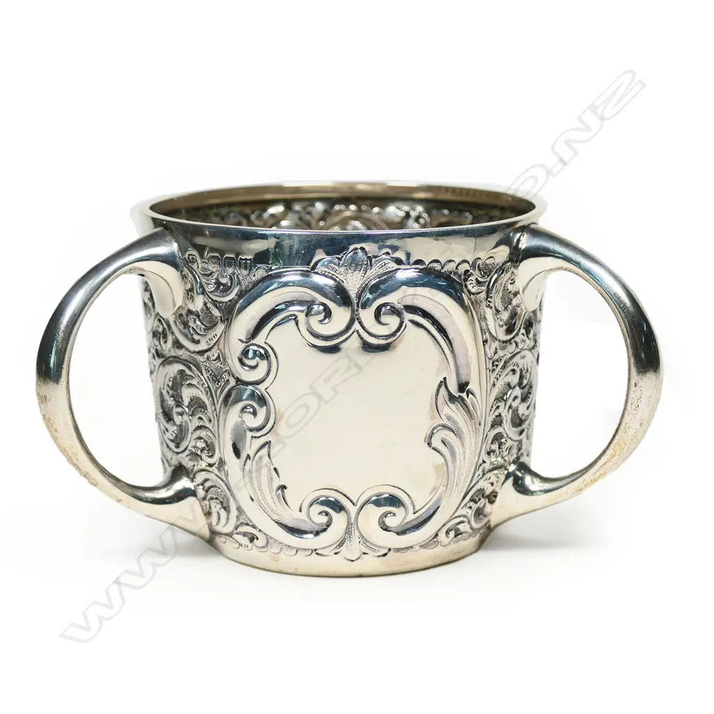 A Victorian silver tyg, by Charles Edwards, London 1895. 217gm. Image 1++