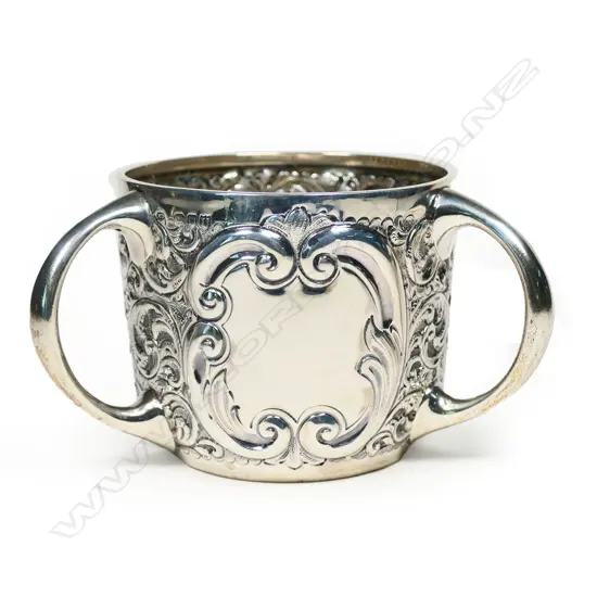 A Victorian silver tyg, by Charles Edwards, London 1895. 217gm.