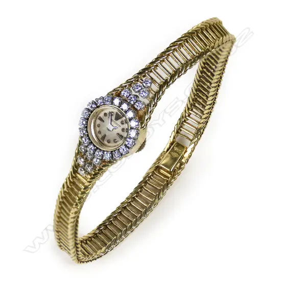 A lady’s 18ct gold and diamond Jaegar LeCoultre wristwatch,