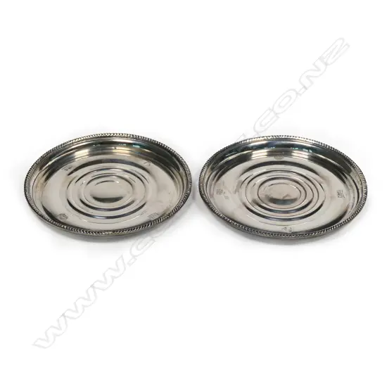 Fred Money pair of 1979 silver coasters in original box,