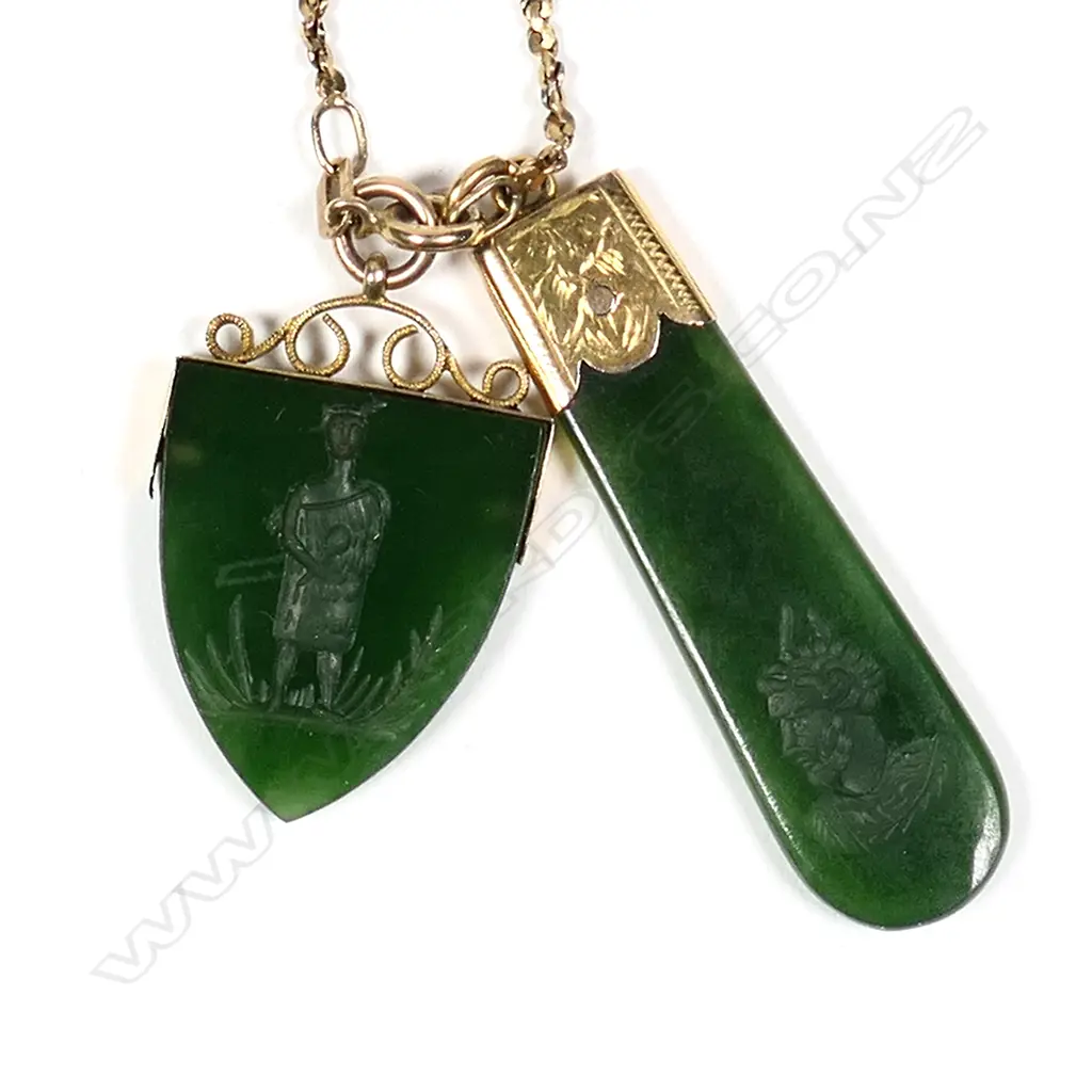 A vintage 9ct yellow gold neck chain with two intaglio cut Māori themed pendants, Image 1++
