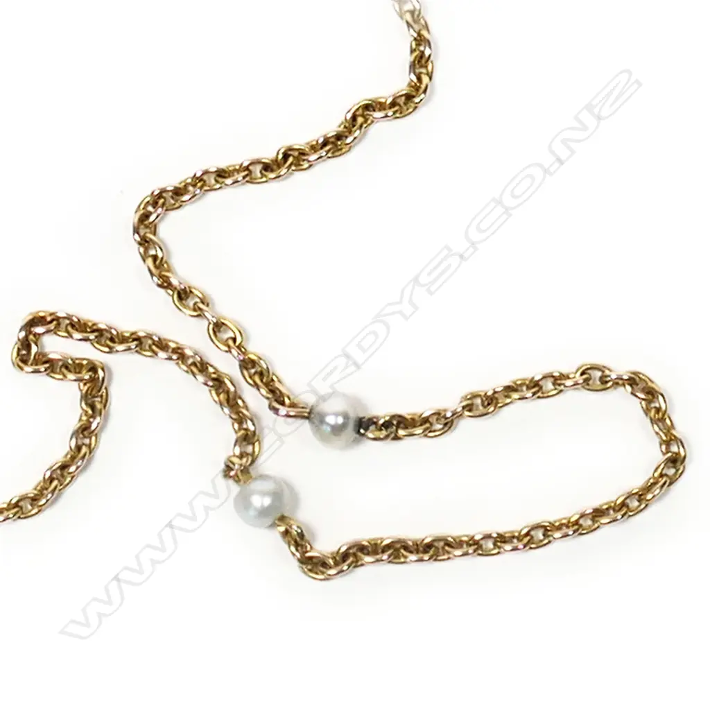 A vintage 18ct yellow gold and seed pearl muff chain Image 1++