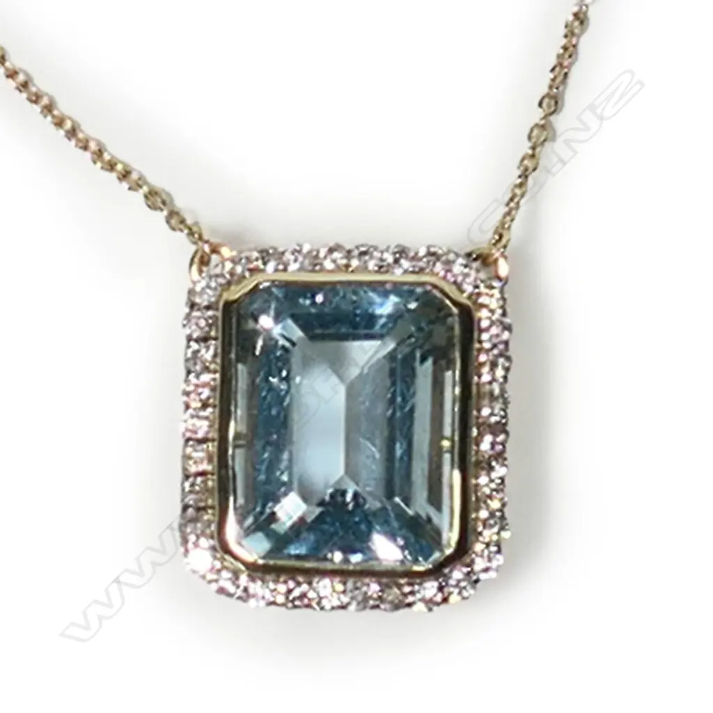 A 14ct gold, aquamarine and diamond halo necklace, Image 1++