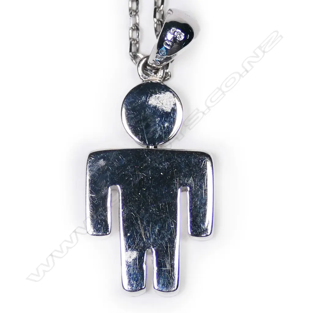 An 18ct white gold and diamond figured pendant, Image 1++