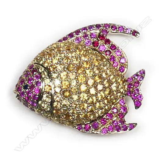 A 9ct yellow gold rubellite and yellow sapphire fish brooch,