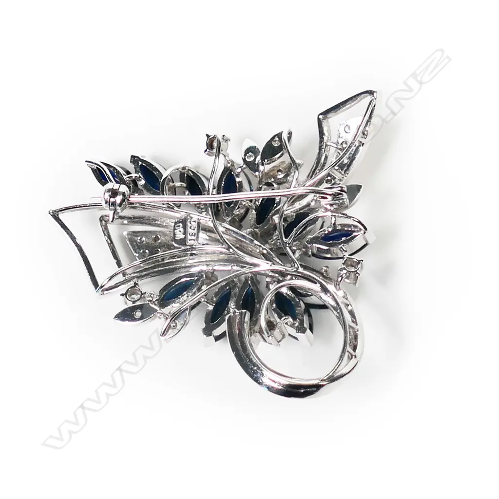 An 18ct white gold diamond and sapphire brooch, Image 1++