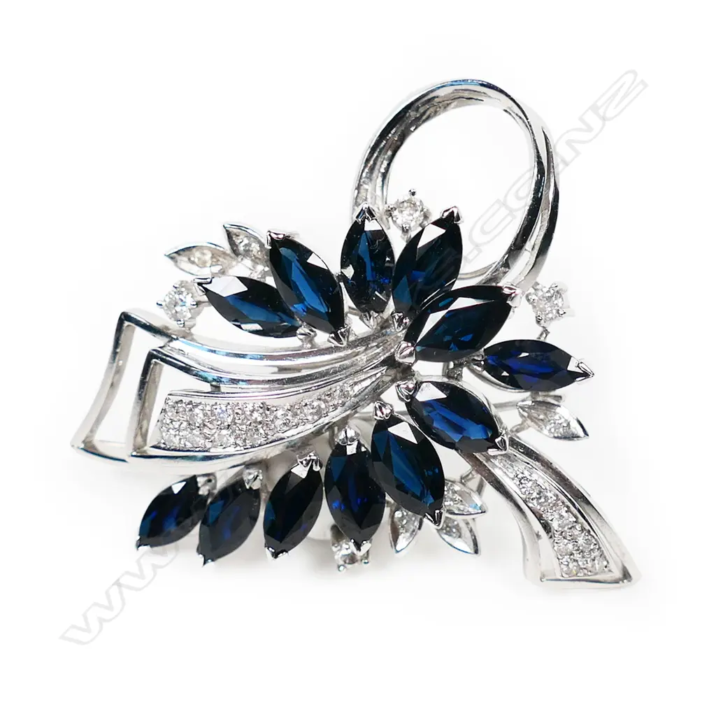 An 18ct white gold diamond and sapphire brooch, Image 1++
