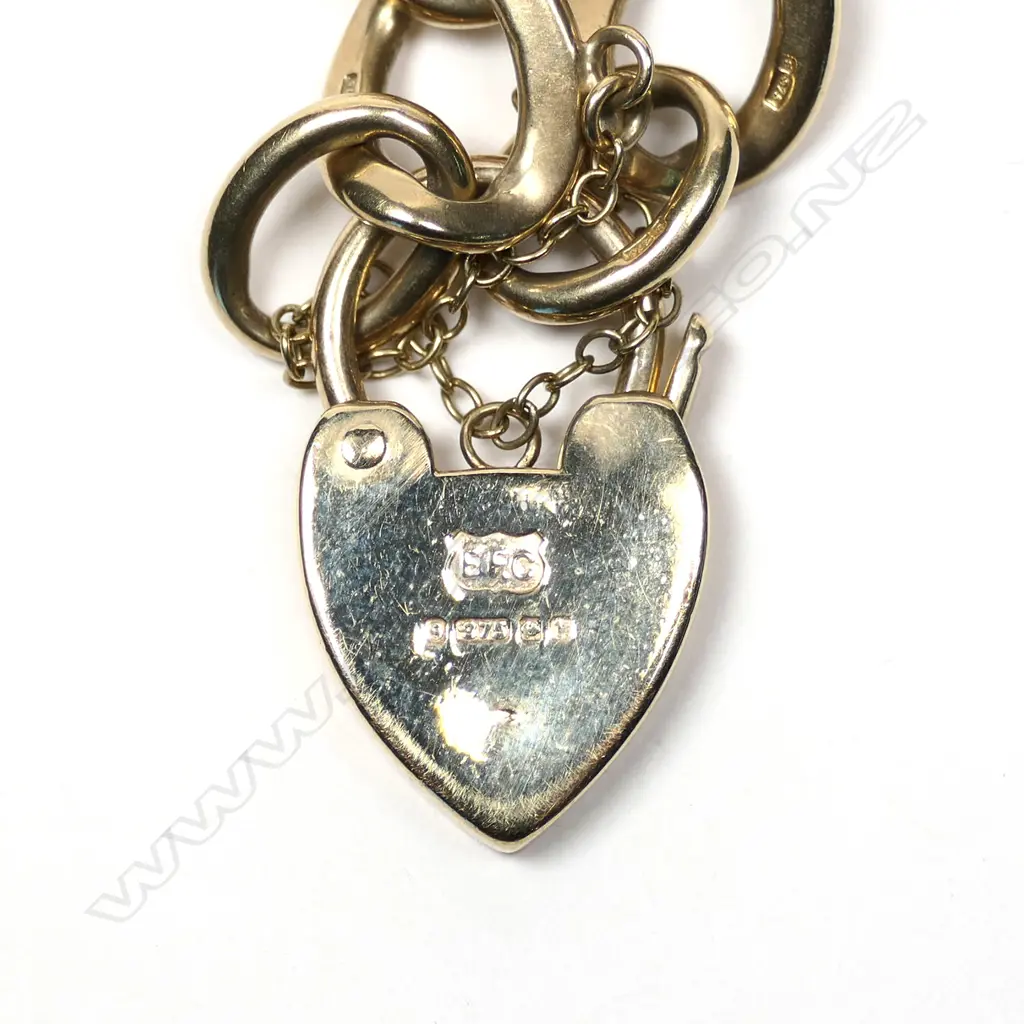 A 9ct yellow gold curb link bracelet Image 1++