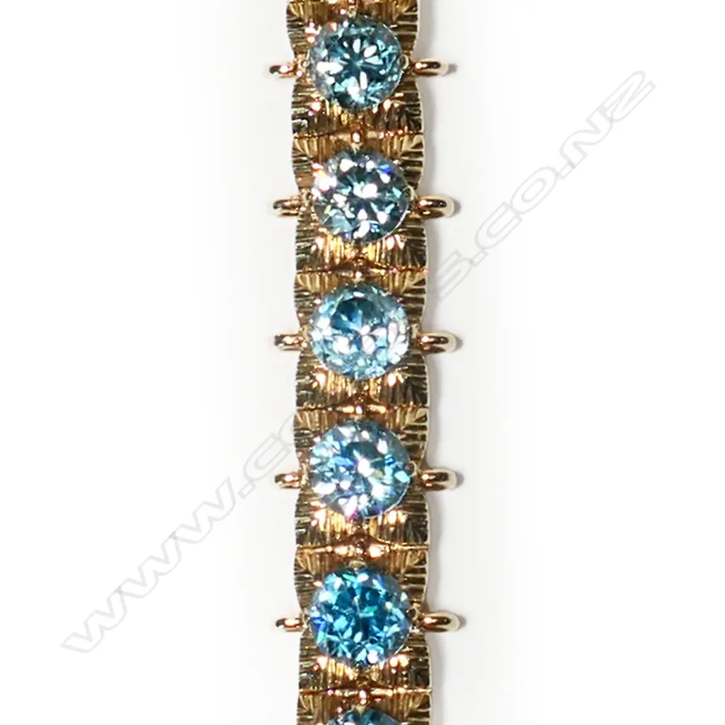 A 9ct gold and blue zircon bracelet, Image 1++