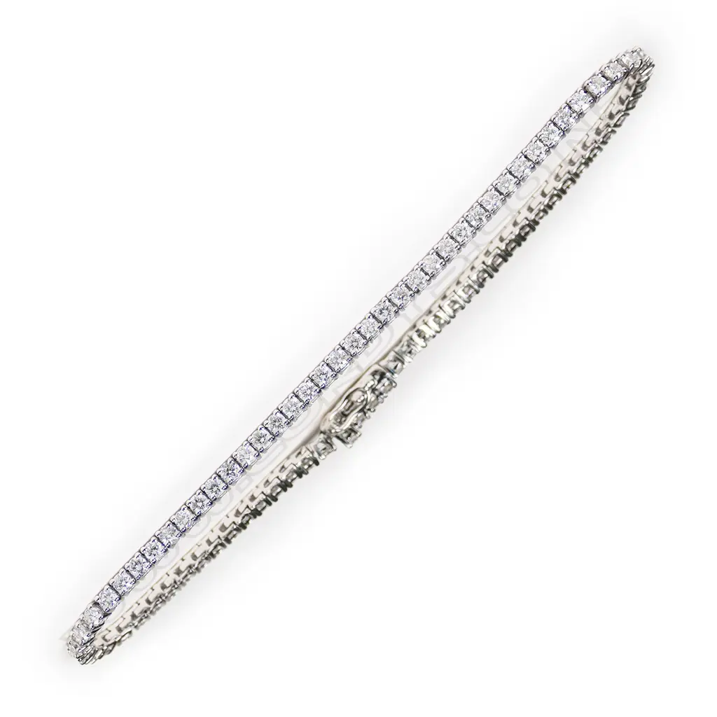 An 18ct white gold and diamond tennis bracelet Image 1++