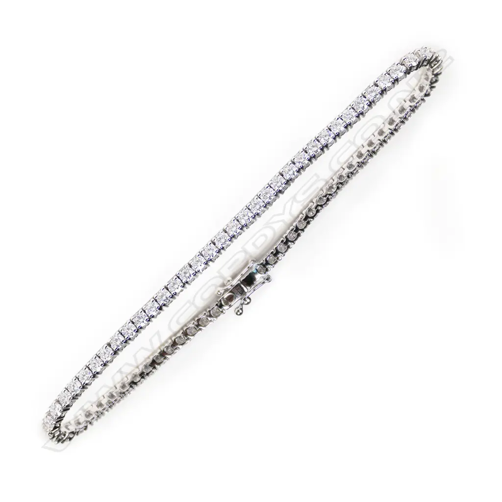 A modern 18ct white gold and diamond tennis bracelet, Image 1++
