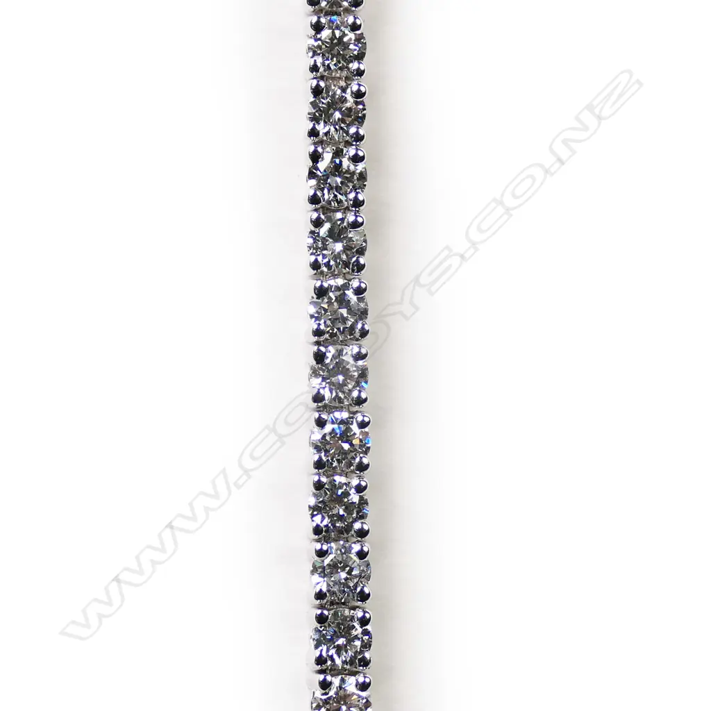 A modern 18ct white gold and diamond tennis bracelet, Image 1++