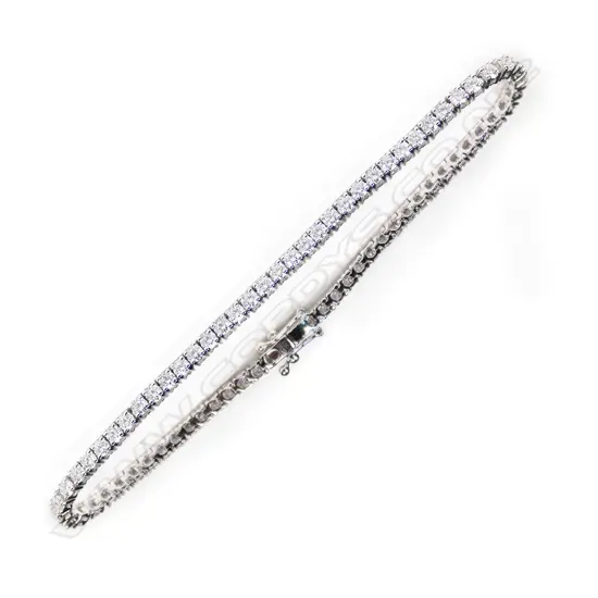 A modern 18ct white gold and diamond tennis bracelet,