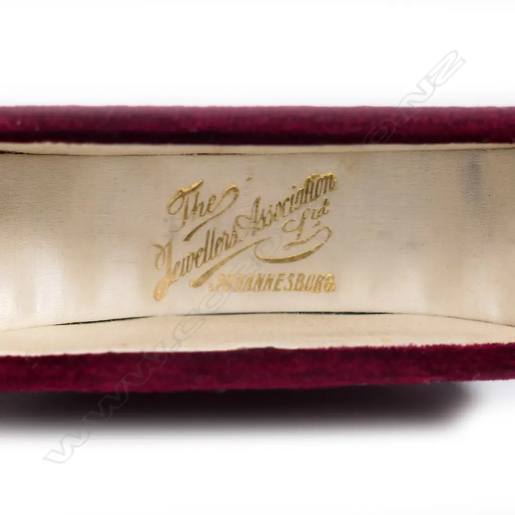 An early 20thC 9ct yellow gold and diamond snap bangle. Image 1++