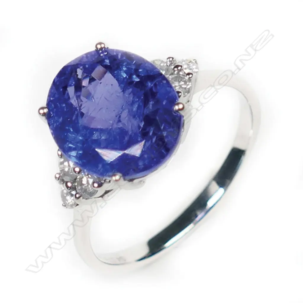 A 14ct white gold, tanzanite and diamond ring, Image 1++