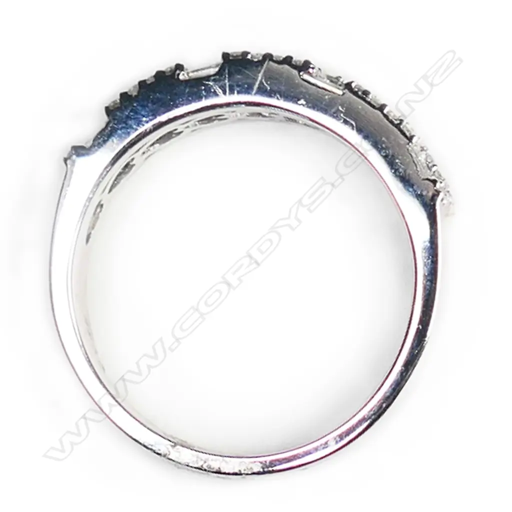 An 18ct white gold and multi diamond band ring, Image 1++