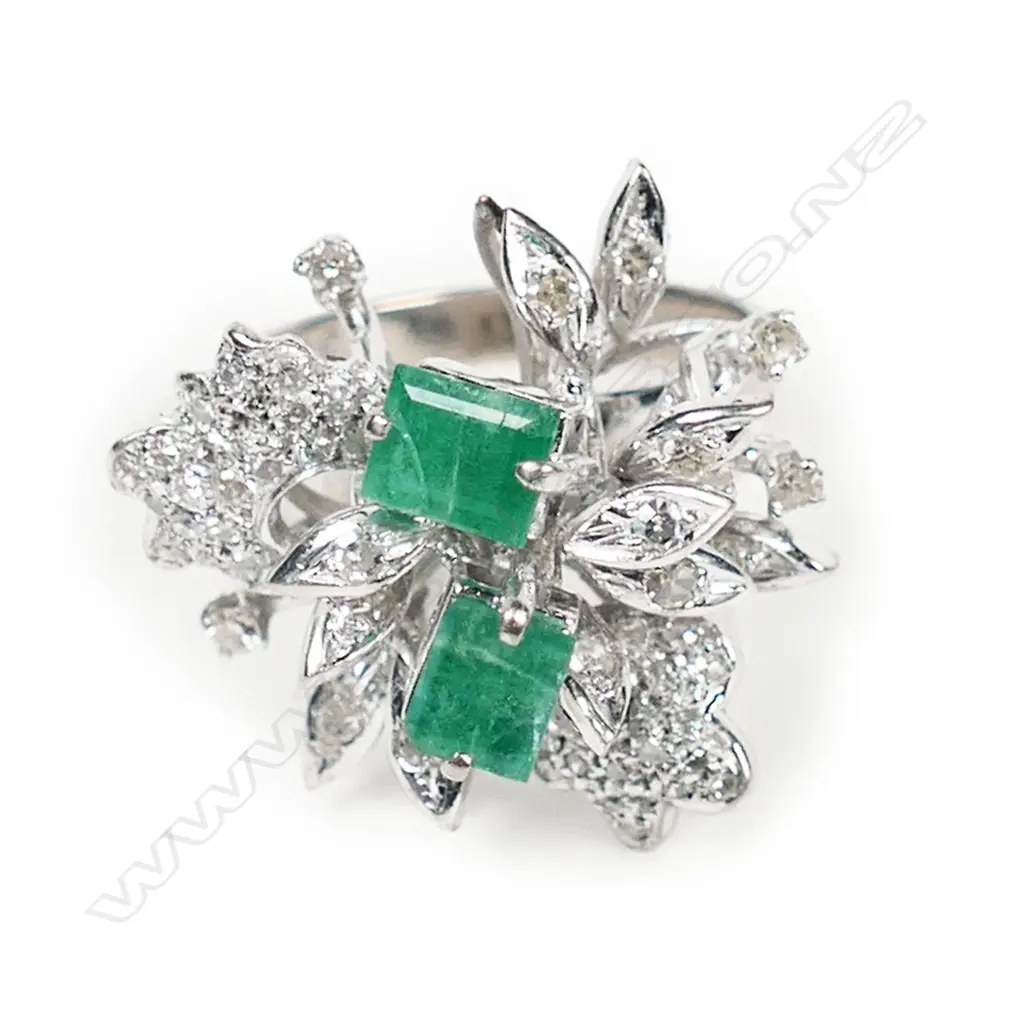 A stylish 1970's 14ct white gold emerald and diamond dress ring, Image 1++