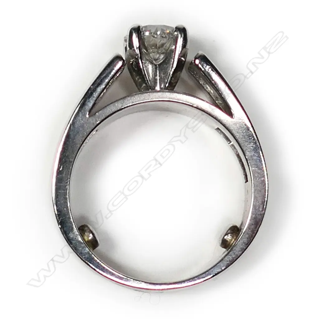 A 14ct white gold diamond solitaire ring Image 1++