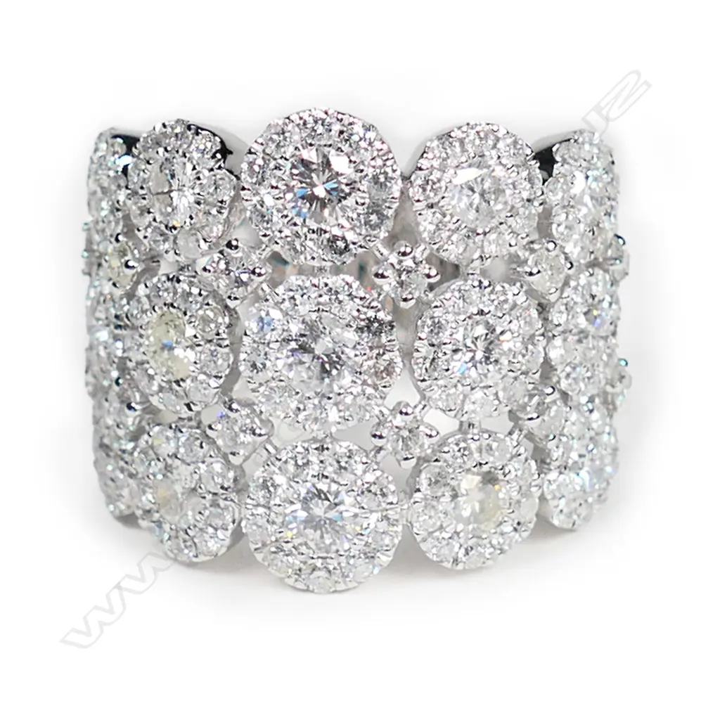 A stylish modern 18ct white gold and multi diamond dress ring, Image 1++